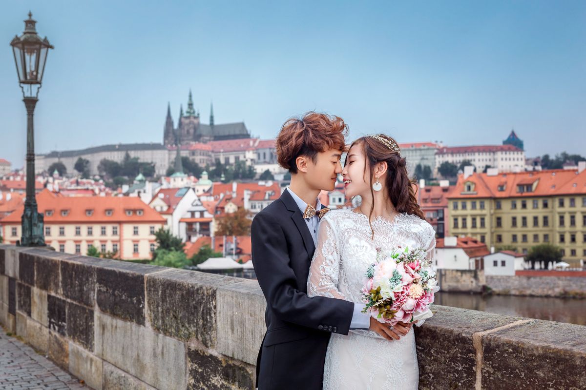 Groom and Bride with a Prague Castle view